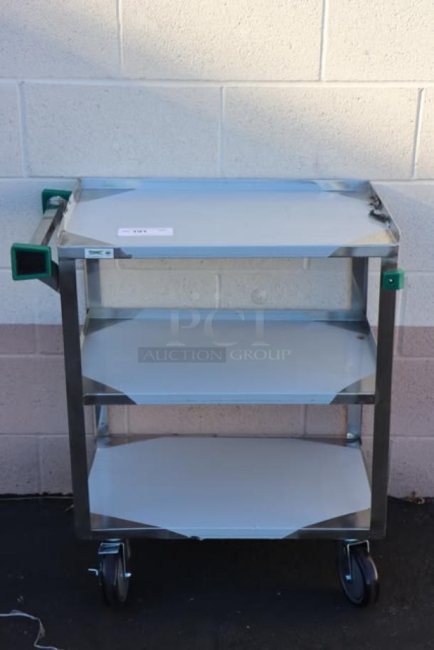 Regency utility cart, model 600CT1627WD, features three 16"x27" shelves, 20 gauge 430 stainless steel, fully welded, new condition.
