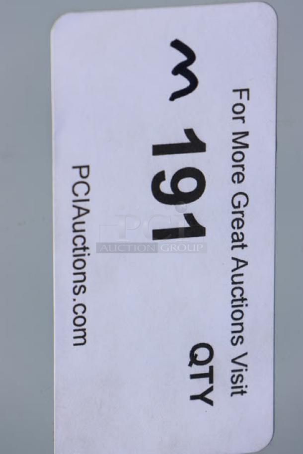 Sticker showing "M 191 QTY" with auction site URL, indicating auction lot number.