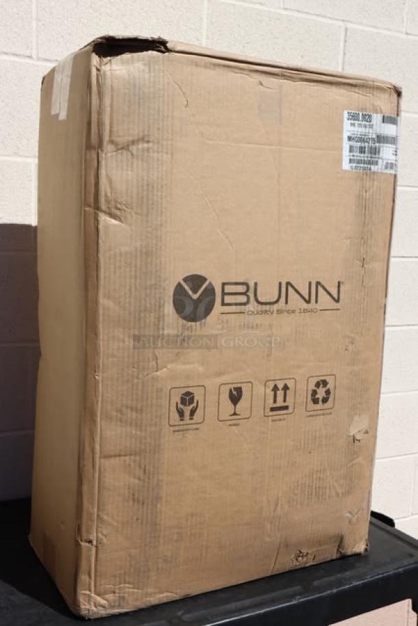 Brand new Bunn 35600.0020 BrewWISE MHG Coffee Grinder in original, damaged packaging. Model S/N: MHG0064275.