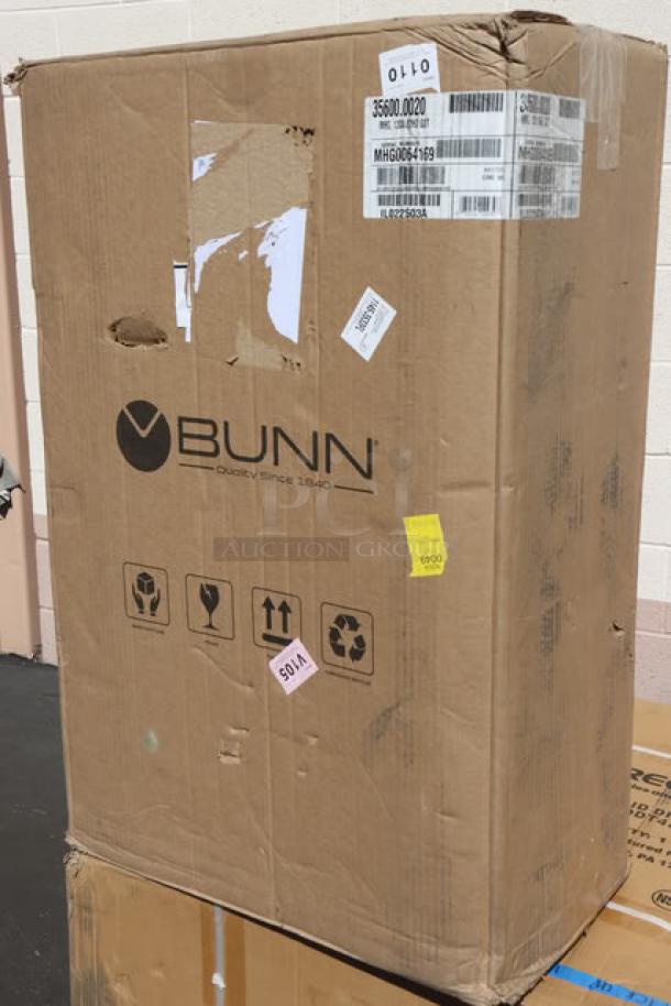 Brand new Bunn 35600.0020 BrewWISE MHG coffee grinder in original packaging. Packaging is damaged. Model and serial number visible.