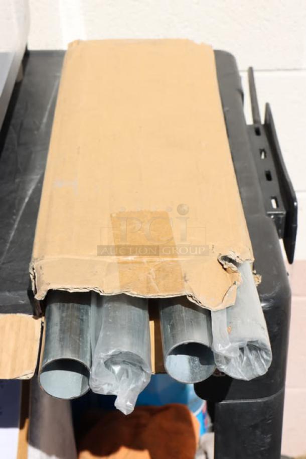 Steelton model 522US12424 pipes in original damaged box. Brand new scratch-n-dent condition. Plastic-wrapped ends visible.