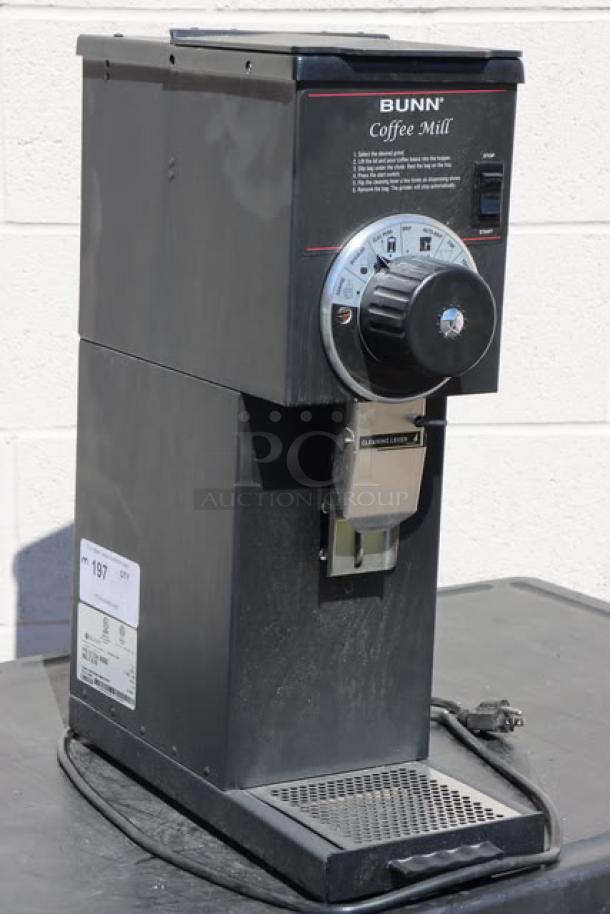 Brand new Bunn G1 HD black coffee grinder, model 22104.0000, 1 lb capacity, 120V, 9A, visible controls and settings.