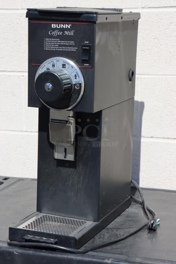 Brand new Bunn 22104.0000 G1 HD 1 lb. black bulk coffee grinder, 120 volts, 9 amps, minor scratches, sturdy design.