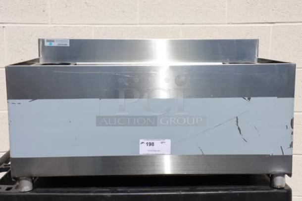 Brand new Steelton 18" x 36" underbar ice bin with bottle holders, model 522UIB1836, minor scratches visible.