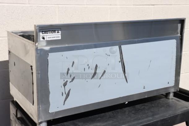 Brand new Steelton 18"x36" underbar ice bin, model 522UIB1836. Features bottle holders. Visible scratches and dents.