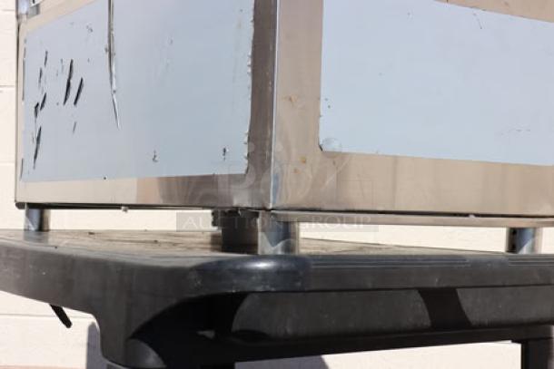 Brand new Steelton 18" x 36" underbar ice bin with bottle holders, model 522UIB1836. Visible scratch and dent marks.