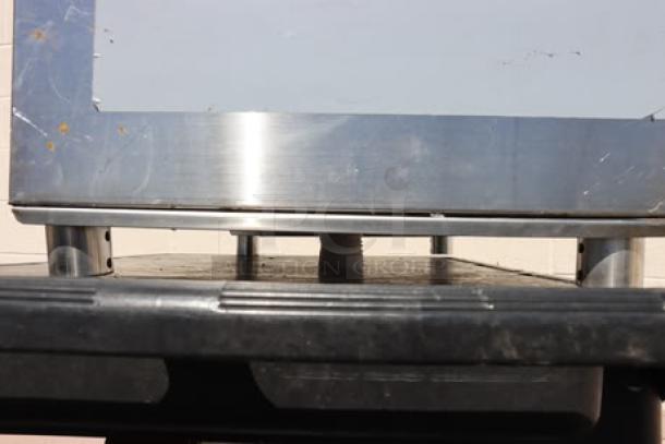 Brand new Steelton 18"x36" underbar ice bin, model 522UIB1836, with bottle holders, minor scratches visible.