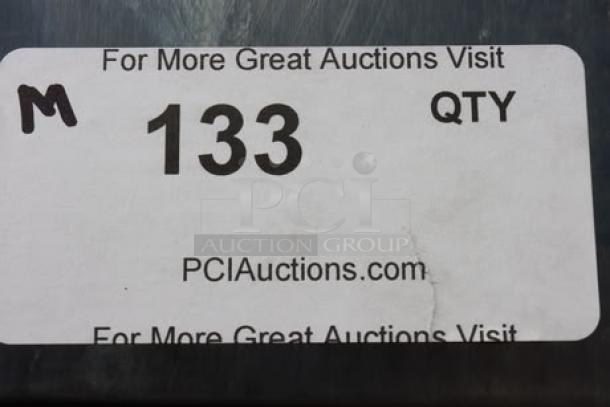 Sticker label showing "133" and "PCIauctions.com," possibly indicating auction item number and website.