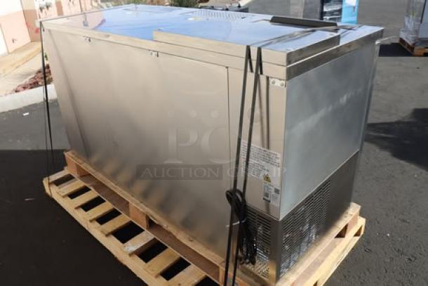 Avantco UDD-3-CT-S-6 stainless steel kegerator with triple tap towers, large dent on bottom left, minor scratches.