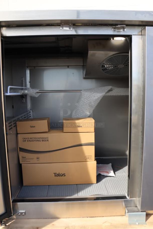 Avantco UDD-3-CT-S-6 kegerator interior view, features Talos boxes, stainless steel, minor dents and scratches visible.