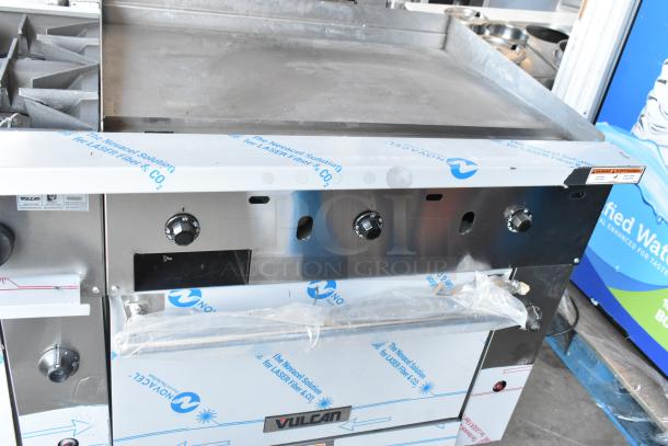 Brand new Vulcan 72SS-6B36GTN commercial range with 6 burners, 36" griddle, 2 ovens, and 310,000 BTU output.