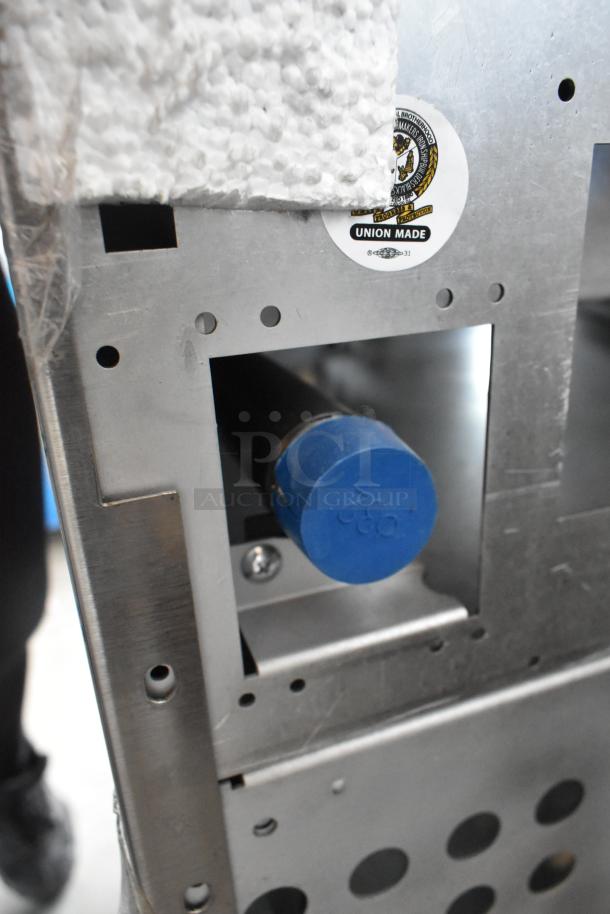 Close-up of Vulcan 72SS-6B36GTN range component, featuring a "Union Made" sticker and protective blue cap.