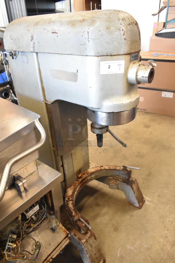 Hobart H 600 T 60 Quart Commercial Mixer, 230V, 3 Phase, Floor Style. Visible wear and markings, heavy-duty construction.