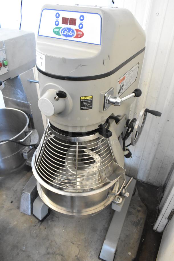 Globe SP40 commercial 40-quart mixer with bowl, guard, whisk, paddle, and dough hook. 220V, 1 phase, floor style.