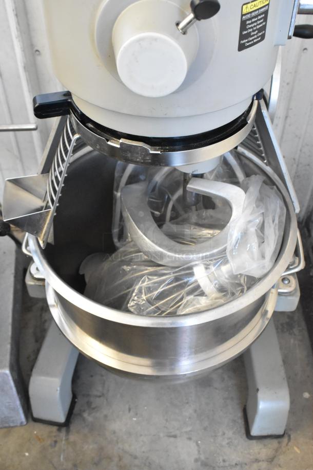 Globe SP40 40 Quart Planetary Mixer with stainless steel bowl, bowl guard, whisk, paddle, and dough hook. 220V, 1-phase.
