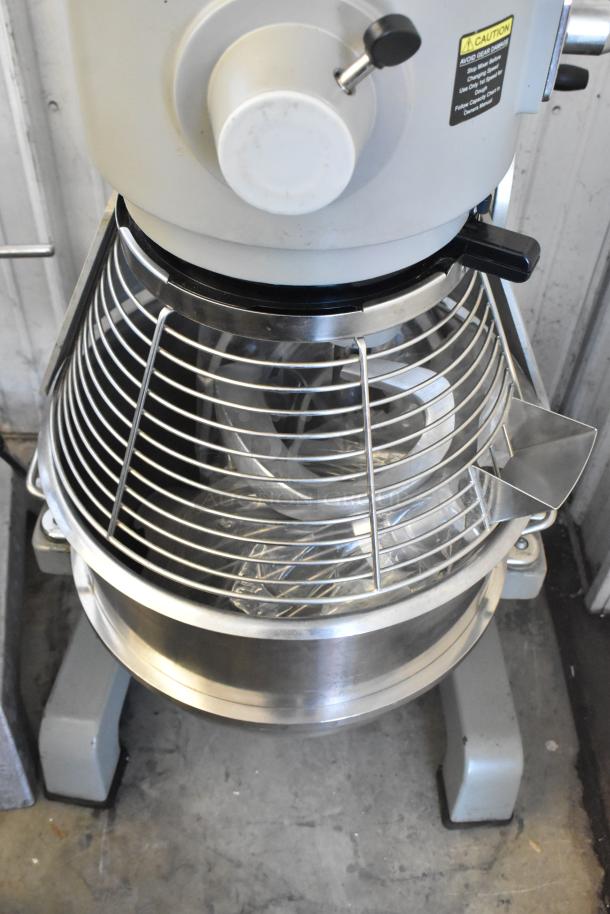 Globe SP40 commercial 40-quart planetary mixer with bowl, guard, whisk, paddle, dough hook. 220V, 1 phase, excellent condition.