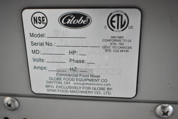 Globe SP40 label showing model, serial number, 220V, 1 phase, 12 amps, and NSF certification for commercial food mixer.
