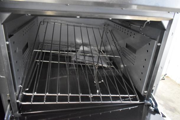 Brand new 2024 CPG ER24-240-1 24" 4-burner electric range, space saver oven, model 351ER24SD, with minor dents.