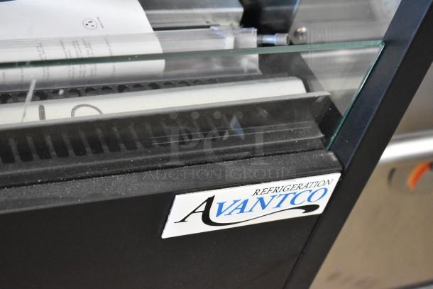 Avantco VOA-60-B 59 1/8" black merchandiser, extra deep, open air with LED lighting, visible Avantco label.