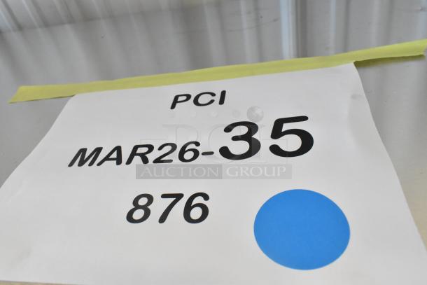 Brand new Pegasus CR-5E electric rotisserie oven, 5 spits, 208V, 3 phase. Scratch and dent condition. Visible tag with numbers.