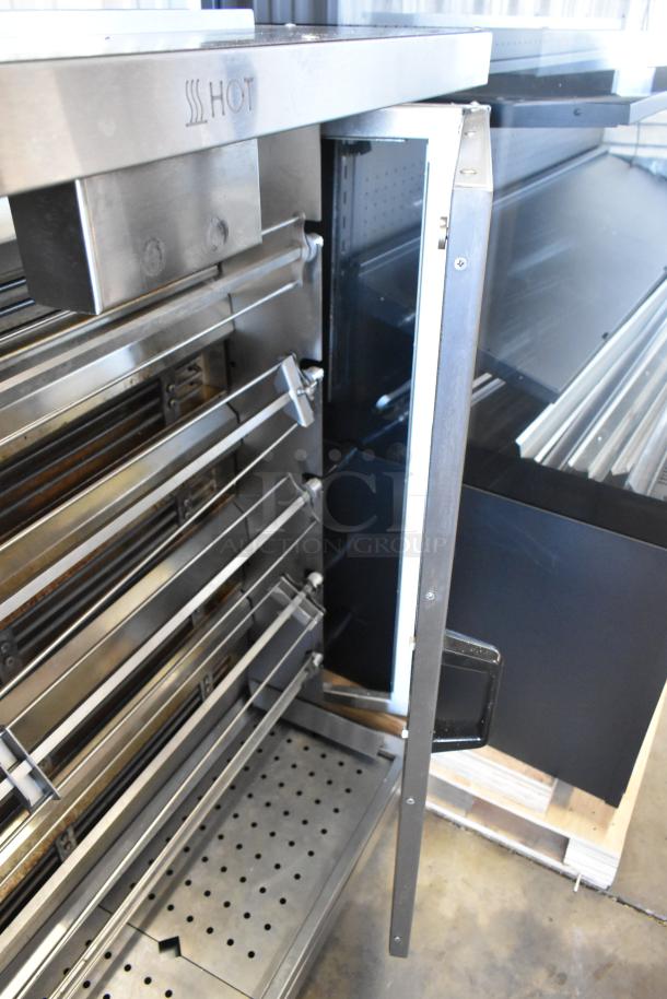 Brand new Pegasus CR-5E Electric Rotisserie Oven, 5 spits, 208V, 3-phase, "HOT" marking, scratch and dent condition.