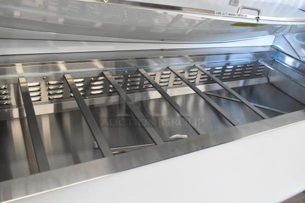 Brand new Avantco 178SSPT71MHC 70" 3-door stainless steel refrigerated sandwich prep table, scratch and dent, 115V.