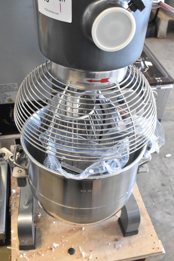 Brand new Avantco 177MX40H 40-quart dough mixer with bowl guard, paddle, whisk, and dough hook. Scratch and dent condition.