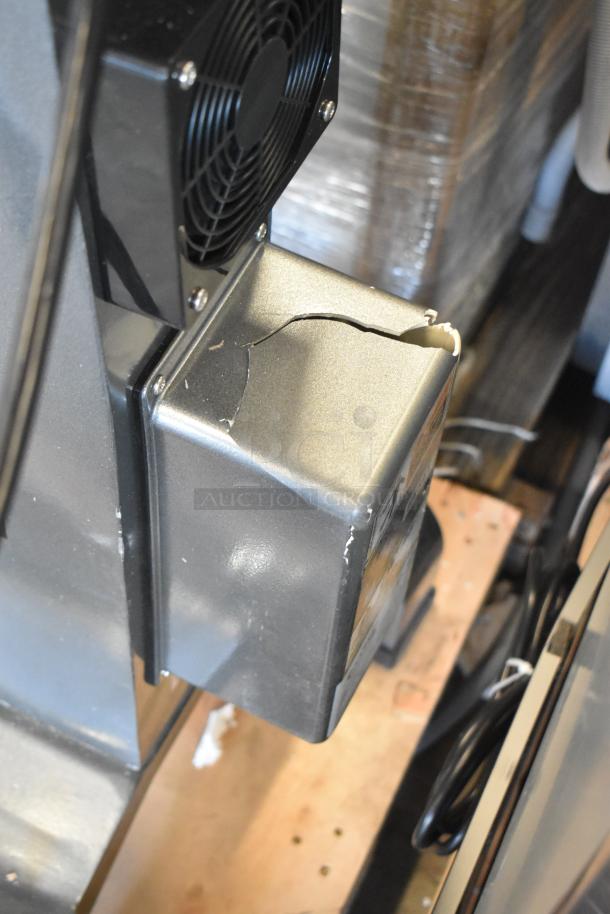 Avantco 177MX40H commercial dough mixer with visible dent and crack near the fan, 240V, 1 phase, includes attachments.