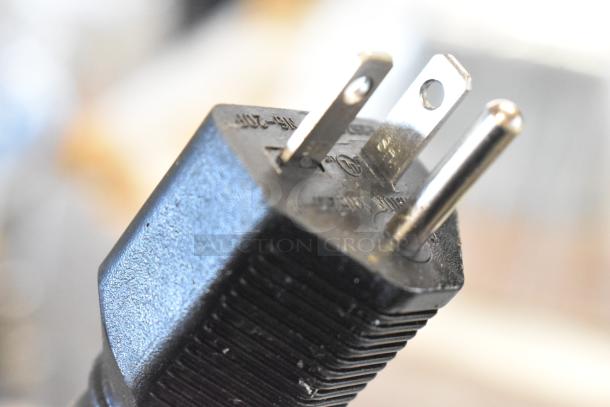 Close-up of a power plug for the Mainstreet 541HTUC30 high-temp undercounter dishwasher, 208V/240V, 1 phase.