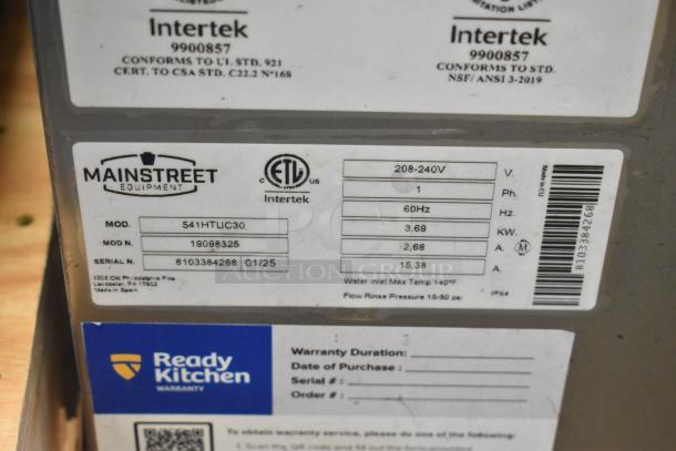 Brand new Mainstreet 541HTUC30 high-temp undercounter dishwasher, 208V/240V, 1 phase, labels show model and serial numbers.