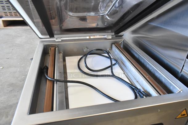 Brand new VacPak-It 186VMC32 chamber vacuum machine, dual 16" seal bars, oil pump, 110-120V, shown open with cord.