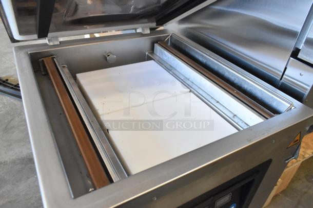 Brand new VacPak-It 186VMC32 chamber vacuum machine with two 16" seal bars. Slight scratch and dent condition.