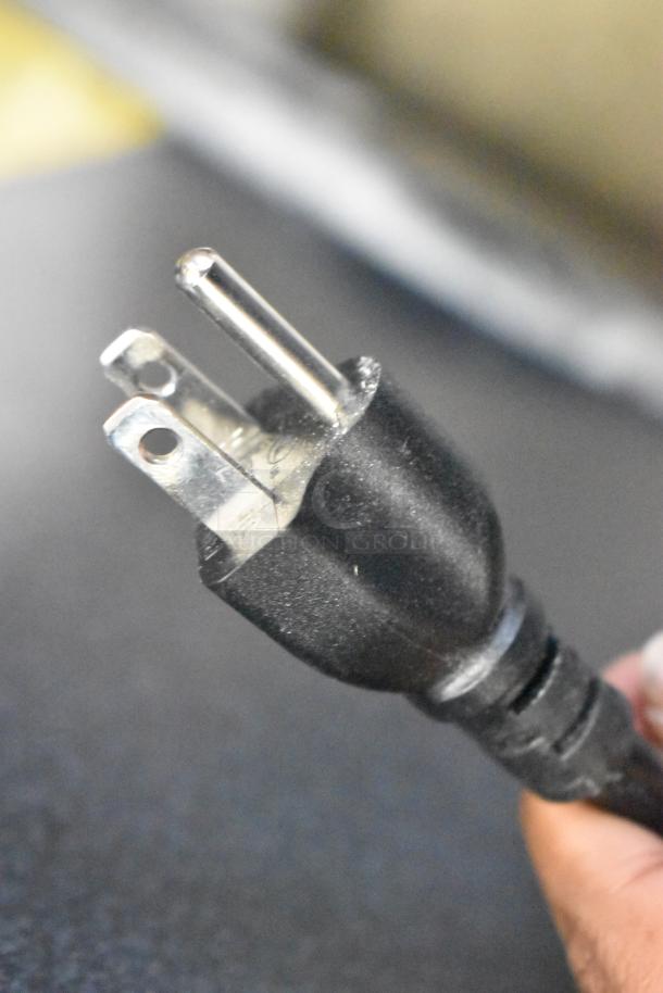 Close-up of a three-prong plug for the 2025 Estella 348EDS18S 18" countertop dough sheeter, 120V, 1 phase.