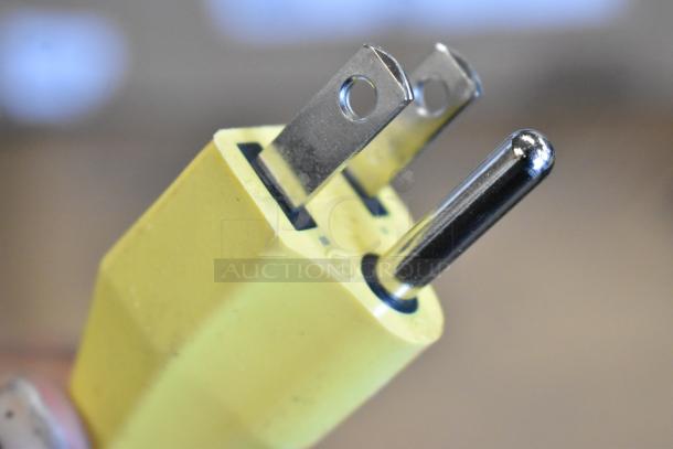 Brand new Karcher NT 68/1 vacuum plug, 120V, 1 phase. Close-up of yellow plug detailing.