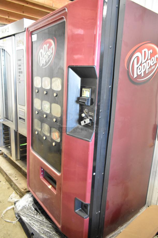 Commercial Dr Pepper canned drink vending machine with bill acceptor, 125 volts, 1 phase, used condition.