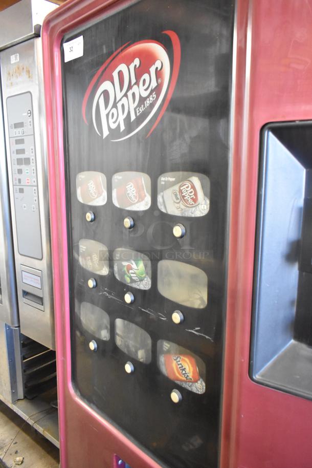 Commercial canned drink vending machine with bill acceptor, displaying Dr Pepper branding. 125 volts, 1 phase.