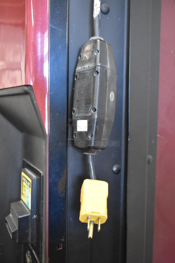 Commercial canned drink vending machine with bill acceptor, 125V, 1 Phase. Features visible power cable and plug connector.