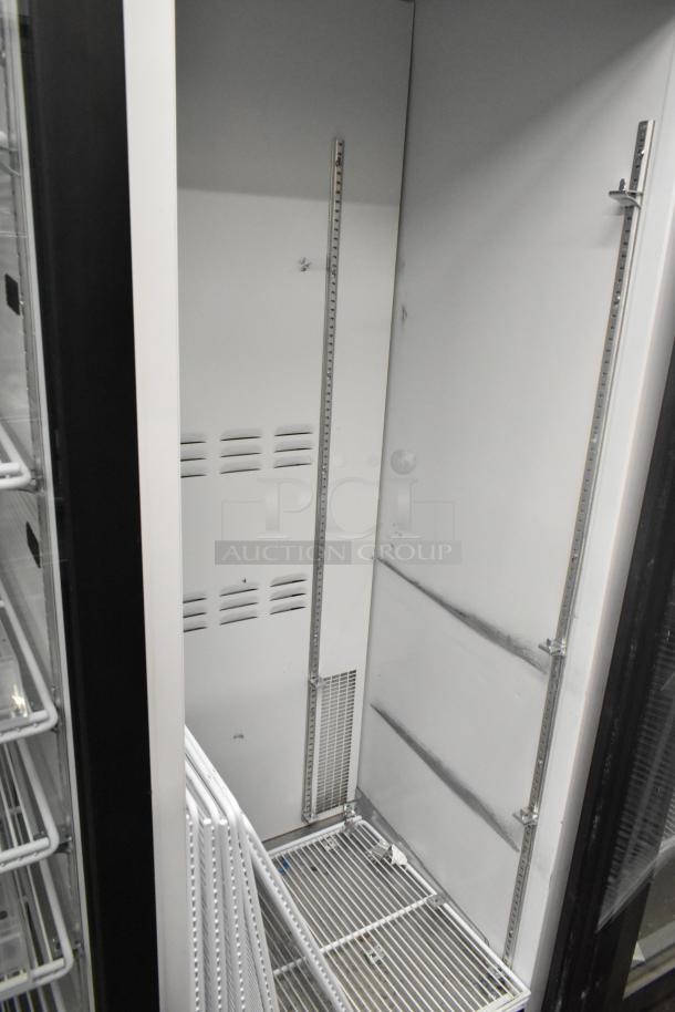 2019 Habco SE18 commercial single door reach-in cooler, 115 volts, 1 phase, adjustable shelves, clean interior, good condition.