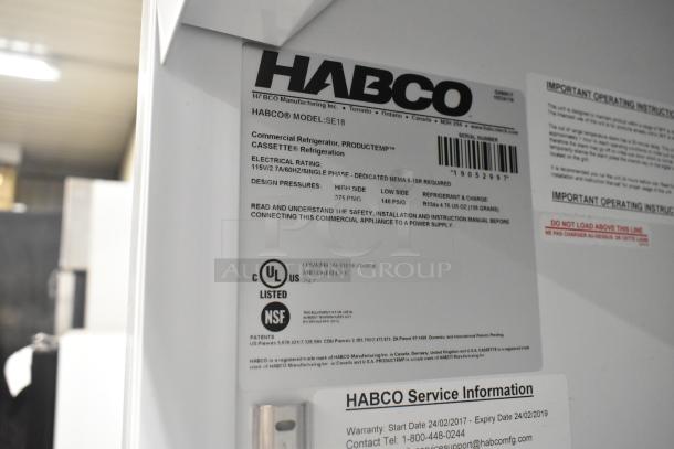 2019 Habco SE18 commercial cooler with tags showing electrical rating (115V) and certifications (UL, NSF).