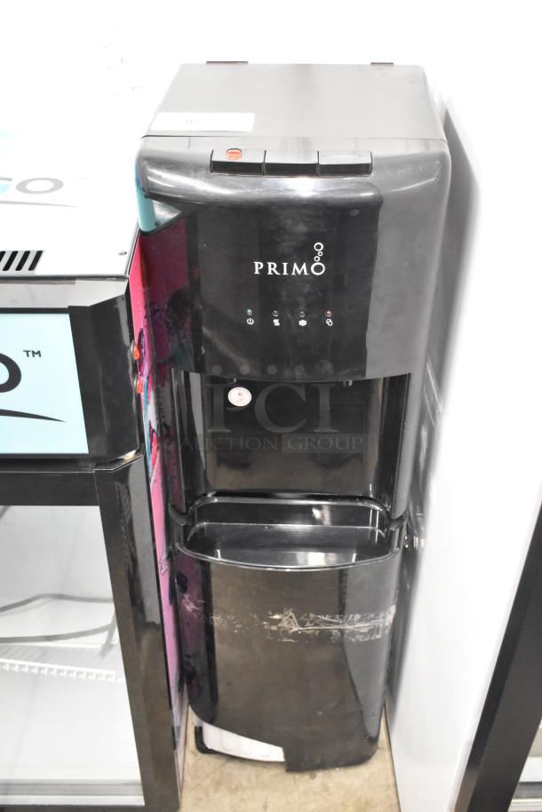 Primo 601088 black bottom load water dispenser, 115V, 1 phase, visible control panel, some surface wear.