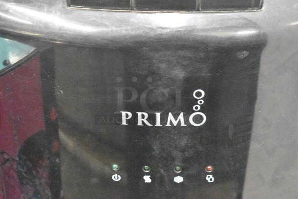 Primo 601088 black bottom load water dispenser, showing logo and indicator lights; 115 volts, 1 phase, good condition.