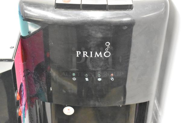Primo 601088 black bottom load water dispenser, 115 volts, 1 phase, features power and function indicators, excellent condition.