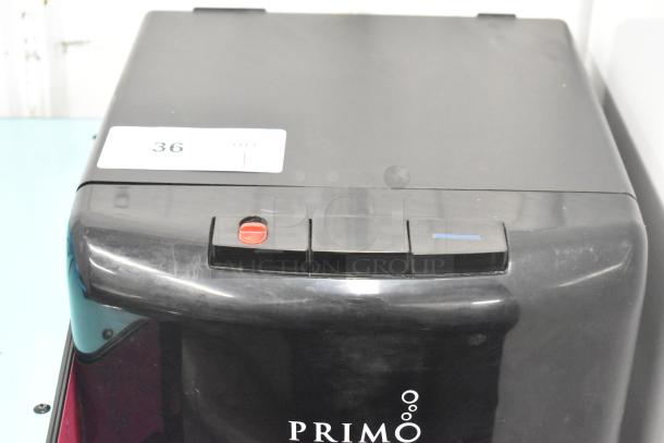 Primo 601088 black bottom load water dispenser, model 601088. 115 volts, 1 phase. Good condition, with label showing "36 QTY".