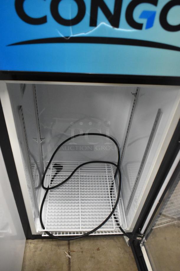 T-40L Mini Cooler Merchandiser, 115 Volts, 1 Phase. Features adjustable shelves, clear interior, good condition.