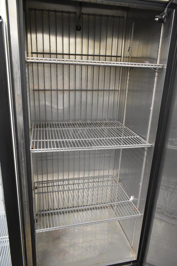 2017 True T-19F single door reach-in freezer, commercial casters, 115V, 1 phase, clean interior with wire shelving, good condition.
