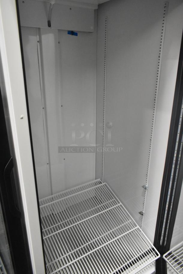 2021 True TSCI-600R-G-PH Single Door Cooler, commercial use, excellent condition, 115V, 1 phase, visible interior shelves.