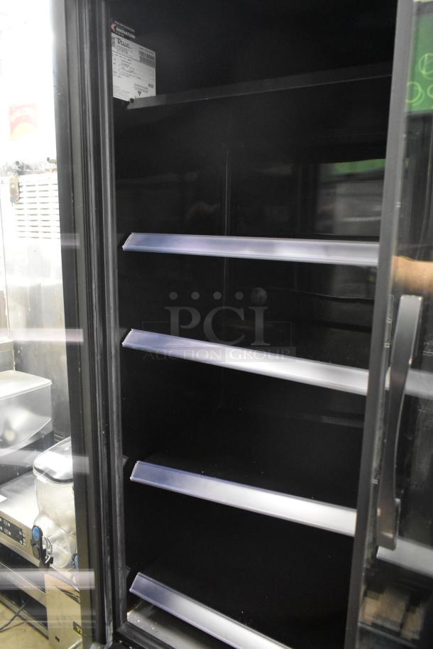 2022 True TVM-48SL-HC Commercial 2 Door Cooler, 115V, 1 Phase, featuring multiple interior shelves, excellent condition.