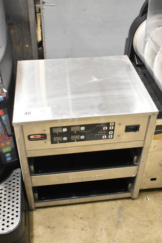 Carter Hoffmann MZ223G warming unit with two 12" compartments, stainless steel, 120V, 1 phase, used condition, digital controls.