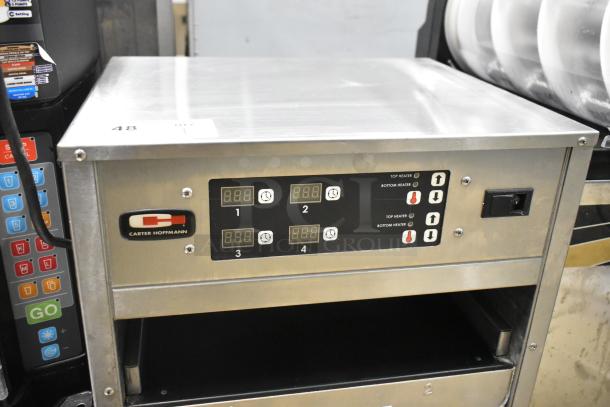 Carter Hoffmann MZ223G commercial warming unit with (2) 12" compartments. Features digital controls, 120V, 1 phase.