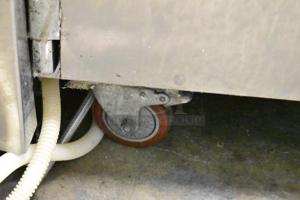 2017 Leader ESLM48S/C prep table caster and tubing, showing commercial-grade construction.